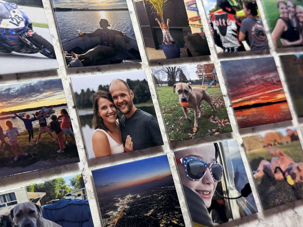 A wall covered edge to edge with finished custom photo magnets